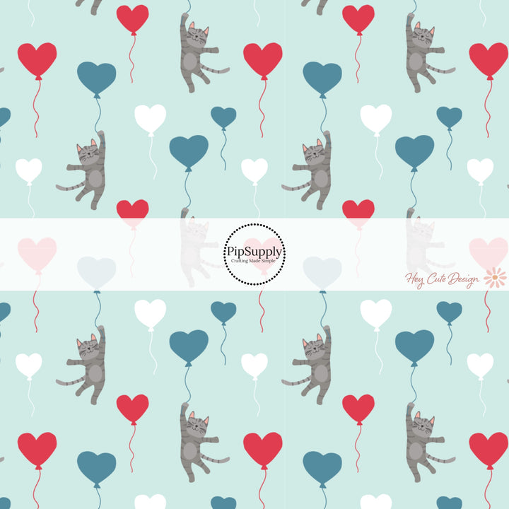 This holiday fabric by the yard features colorful heart balloons and kittens. This festive pattern fabric can be used for all your sewing and crafting needs!