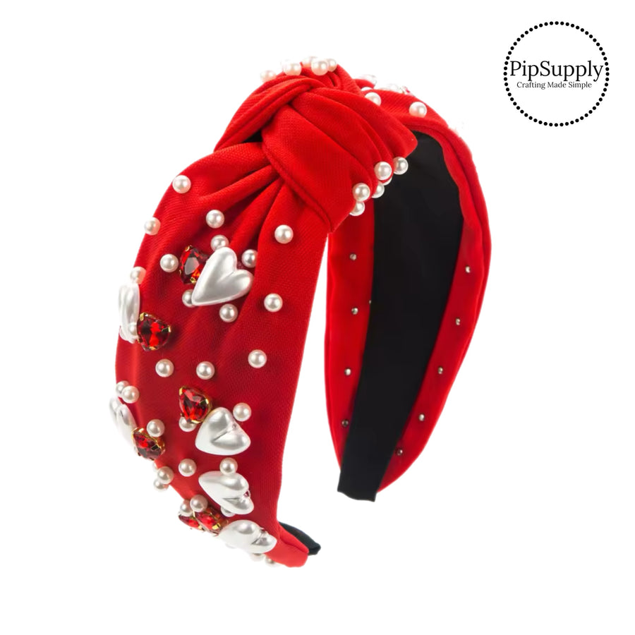 These Valentine's Day embellished headbands are a stylish hair accessory having the look of a knotted headwrap and the on and off ease of a headband. Made with thick high quality fabric these headbands are a perfect simple and fashionable answer to keeping your hair back!