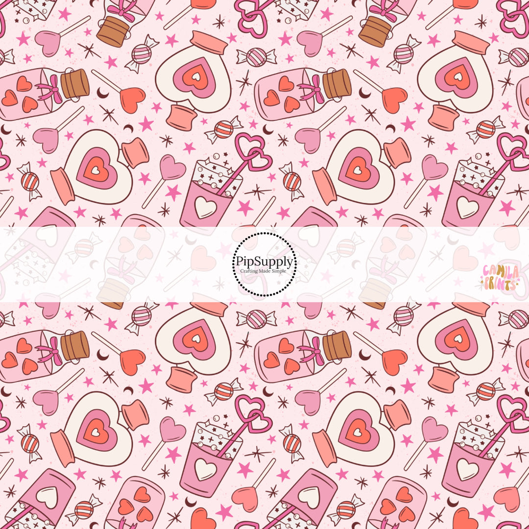 This holiday fabric by the yard features potions on pink. This festive pattern fabric can be used for all your sewing and crafting needs!