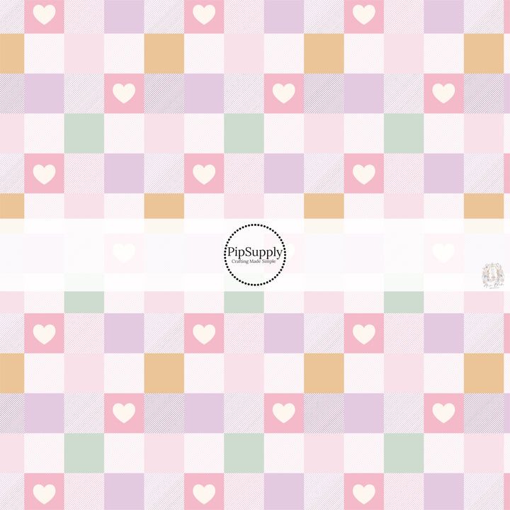 This spring floral fabric by the yard features pastel spring checker pattern with strips and hearts. This seasonal pattern fabric can be used for all your sewing and crafting needs!