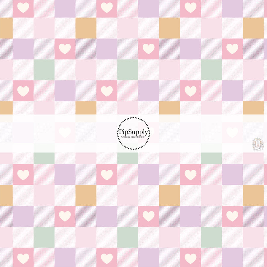 This spring floral fabric by the yard features pastel spring checker pattern with strips and hearts. This seasonal pattern fabric can be used for all your sewing and crafting needs!