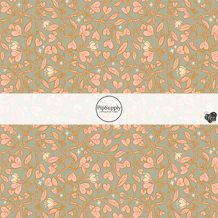 This holiday fabric by the yard features heart floral vines. This festive pattern fabric can be used for all your sewing and crafting needs!