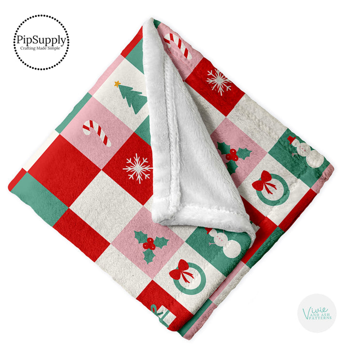 This winter designer pattern is printed onto the front side of our soft touch minky blankets. The backside will not be printed and left the natural cream/white color of the blanket. This print pattern features colorful Christmas checkered pattern.