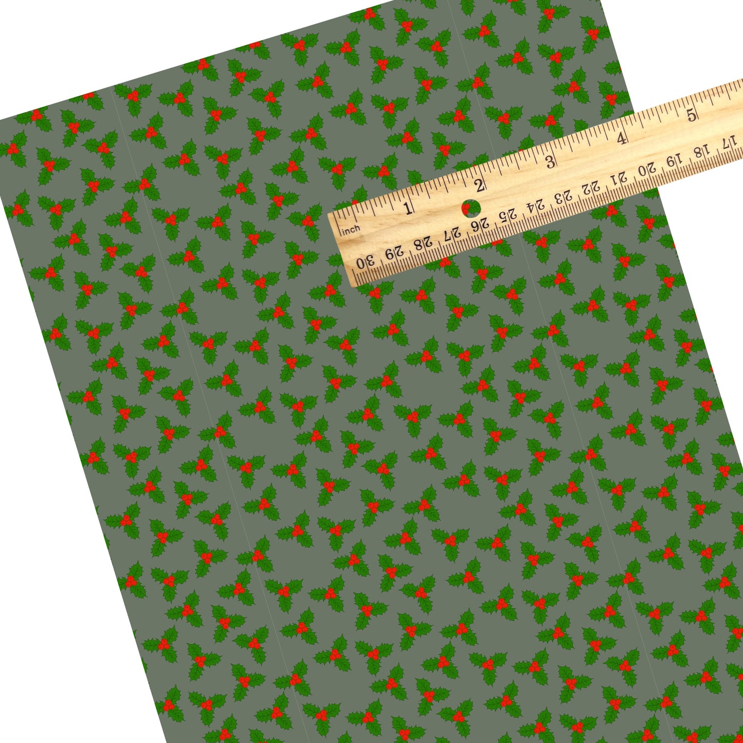 These Christmas themed pattern faux leather sheets contain the following design elements: holly berries on grey. Our CPSIA compliant faux leather sheets or rolls can be used for all types of crafting projects.