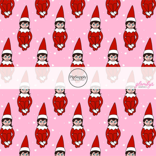 These Christmas themed pattern fabric by the yard features the following design elements: elves on pink. This fun themed fabric can be used for all your sewing and crafting needs!