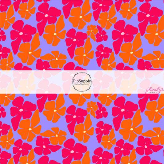 This tropical fabric by the yard features pink and orange tropical flowers on purple. This fun summer themed fabric can be used for all your sewing and crafting needs!