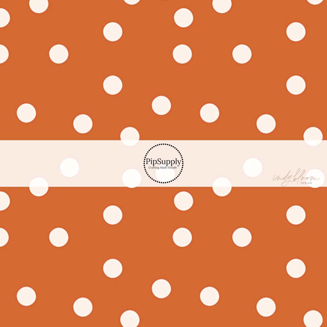 These dot themed no sew bow strips can be easily tied and attached to a clip for a finished hair bow. These fun dot bow strips are great for personal use or to sell. The bow stripes features small white dots on orange.