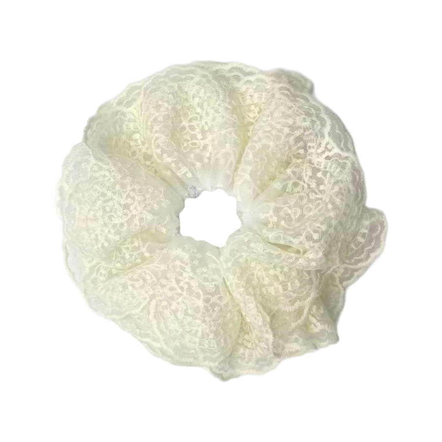 These lace ruffled scrunchies are a beautiful accessory to add to any look or hair style. The scrunchie has an elastic band sewn inside for stretch-ability.