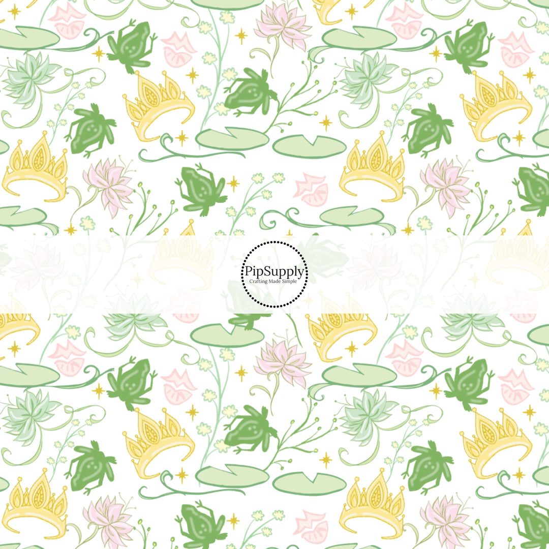 These magical princess themed fabric by the yard features crowns, frogs, and water lily pads. This fun pattern fabric can be used for all your sewing and crafting needs!