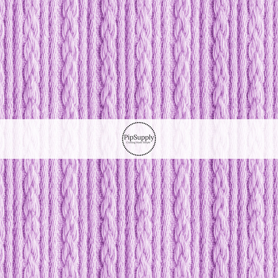 This winter pattern fabric by the yard features lavender cable knit sweater pattern. This fun winter fabric can be used for all your sewing and crafting needs!