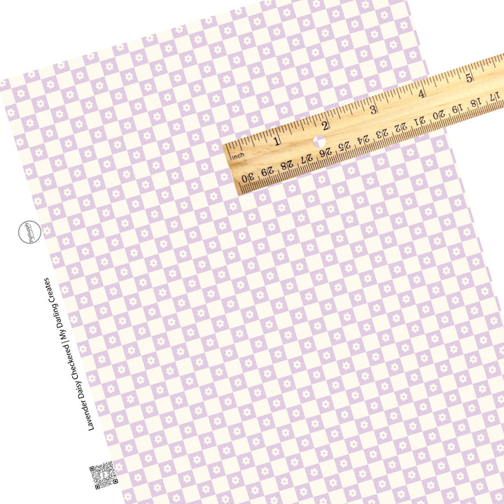 These spring pattern themed faux leather sheets contain the following design elements: lavender and cream checkered pattern with small daisies. Our CPSIA compliant faux leather sheets or rolls can be used for all types of crafting projects.