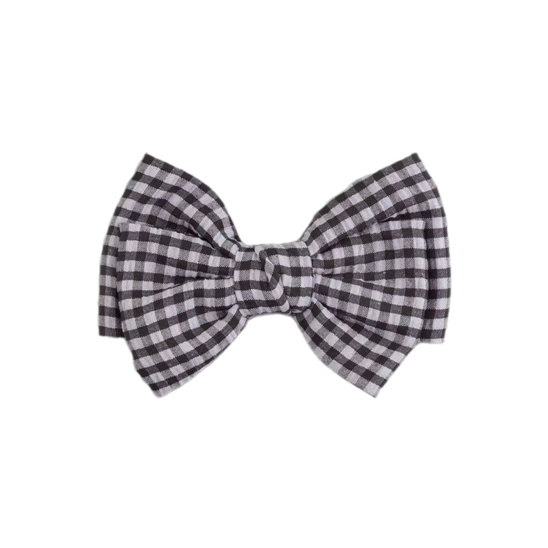 These layered plaid pre-cut tied bows are ready to package and resell to your customers no sewing or measuring necessary! These hair bows come with a clip already attached.