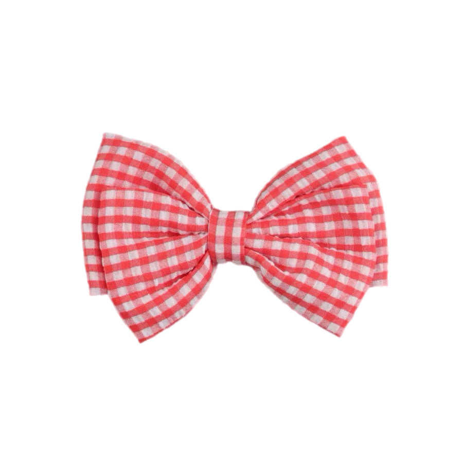 These layered plaid pre-cut tied bows are ready to package and resell to your customers no sewing or measuring necessary! These hair bows come with a clip already attached.