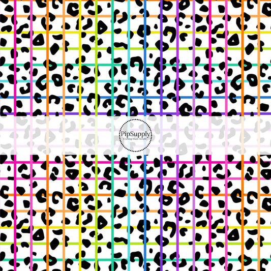 This animal fabric by the yard features rainbow grid on leopard pattern. This fun themed fabric can be used for all your sewing and crafting needs!