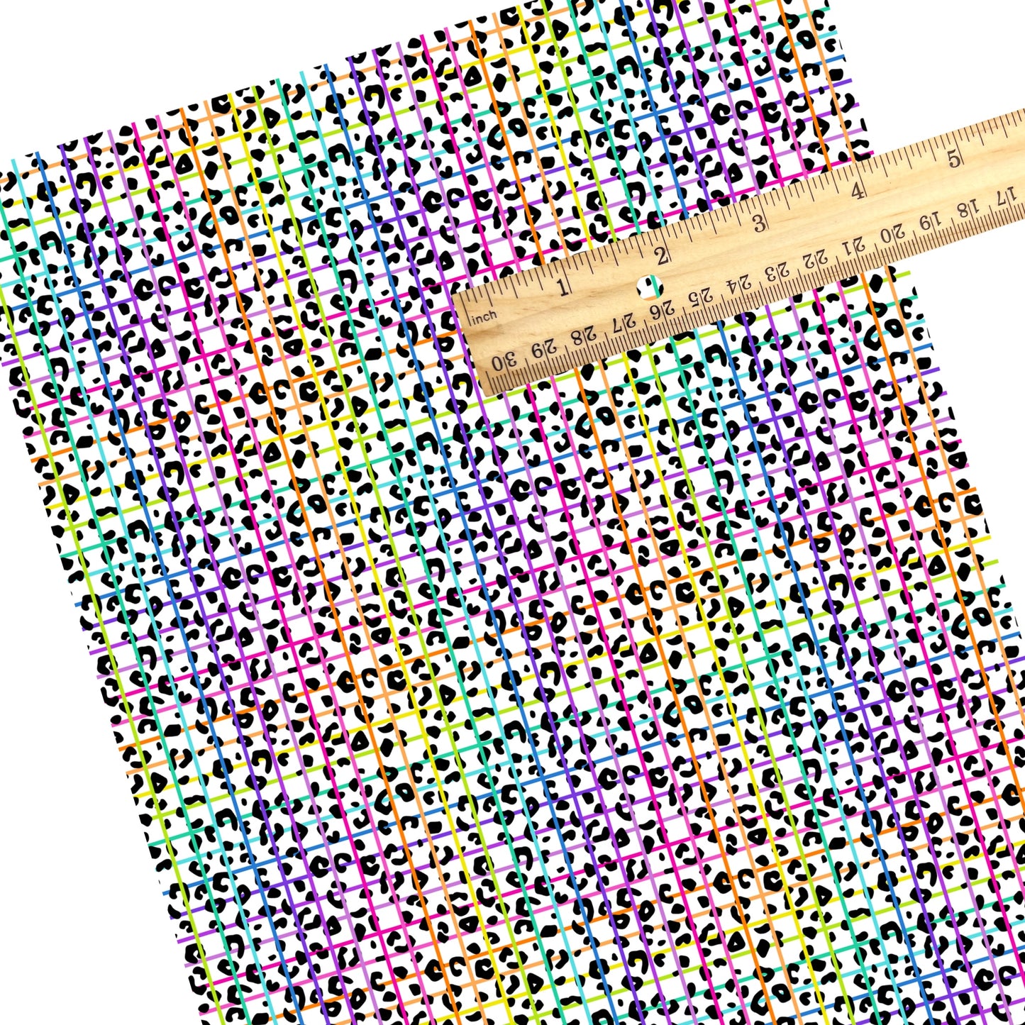 These animal faux leather sheets contain the following design elements: rainbow grid on leopard pattern. Our CPSIA compliant faux leather sheets or rolls can be used for all types of crafting projects.