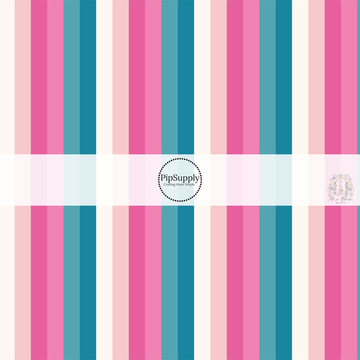 These stripe themed blue, cream, and pink fabric by the yard features white, cream, light pink, pink, teal and blue stripes. 