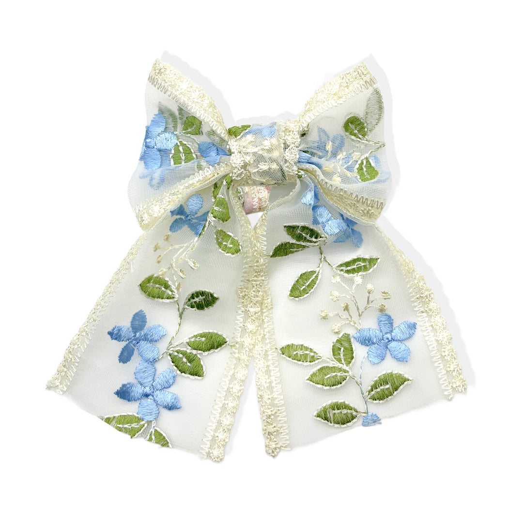 These spring blue floral with green leaves embroidered pre-cut tied bows are ready to package and resell to your customers no sewing or measuring necessary! These hair bows come with a alligator clip already attached.