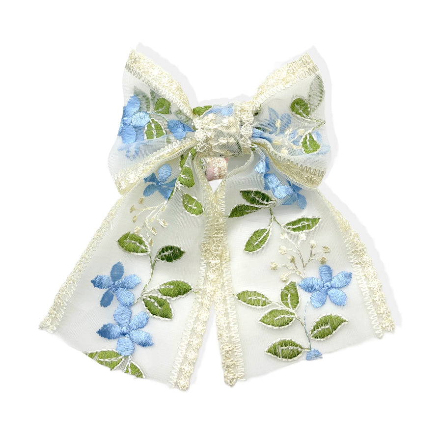 These spring blue floral with green leaves embroidered pre-cut tied bows are ready to package and resell to your customers no sewing or measuring necessary! These hair bows come with a alligator clip already attached.