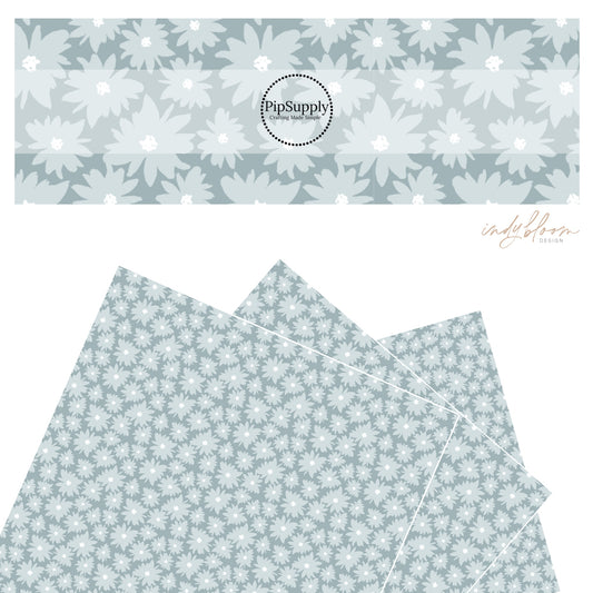 These light colored flowers on light blue faux leather sheets contain the following design elements: hyacinth blue and gray bloom flowers. 
