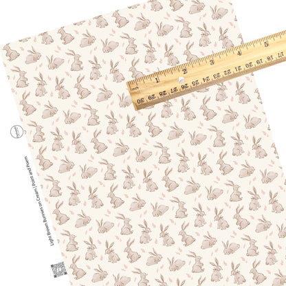 These spring pattern themed faux leather sheets contain the following design elements: light brown bunnies on cream. Our CPSIA compliant faux leather sheets or rolls can be used for all types of crafting projects.