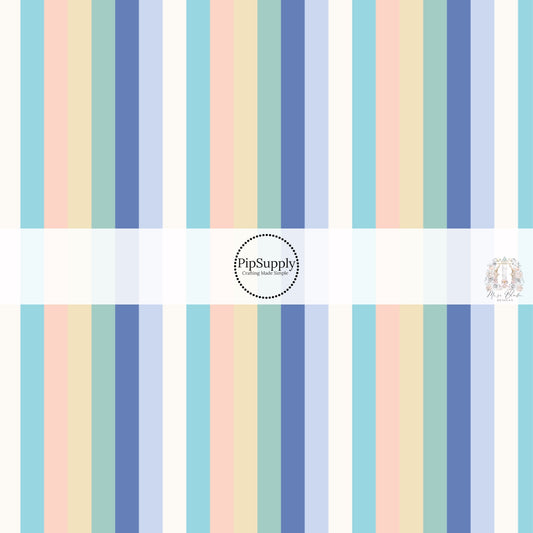 These stripe themed seafoam and periwinkle fabric by the yard features white, tan, teal, aqua, light blue, and periwinkle stripes. 