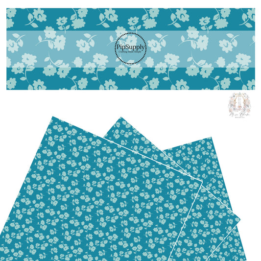These floral themed dark teal faux leather sheets contain the following design elements: light blue flowers on dark teal. 