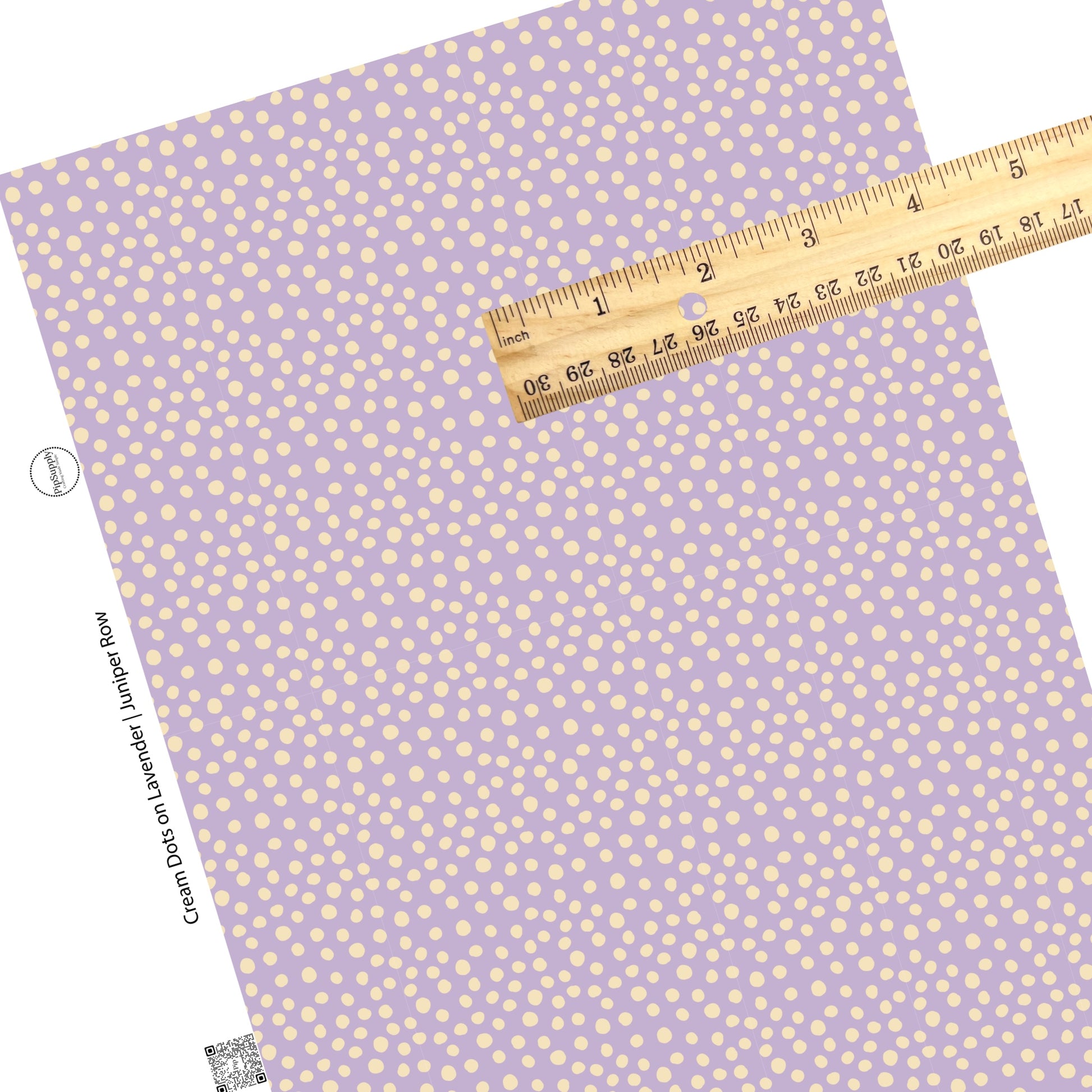 These dot themed pastel purple faux leather sheets contain the following design elements: small cream dots scattered on light purple.