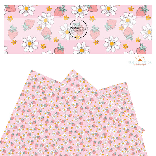 Pastel orange flowers, white daisies and pastel strawberries on pink faux leather sheets.