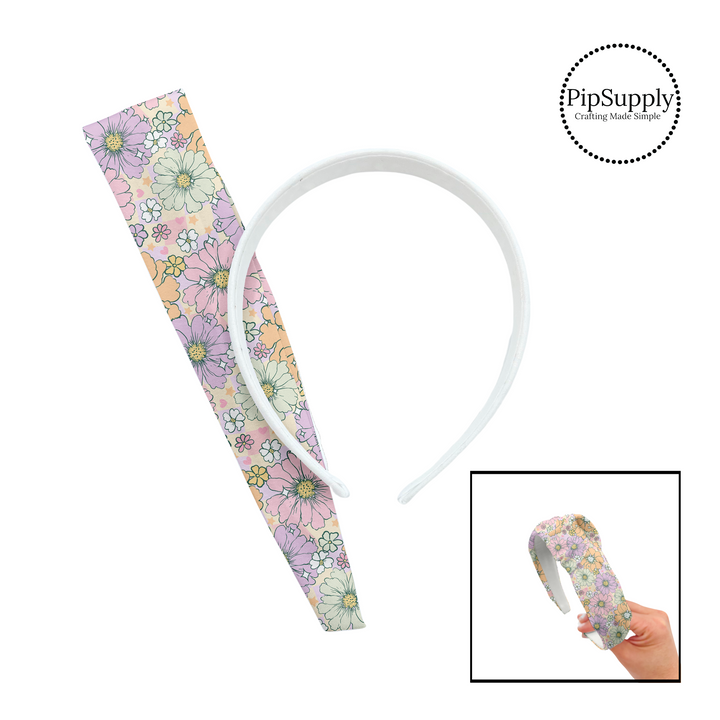 Light pink, purple, orange, and white flowers on a purple and cream checker board pattern DIY knotted headband kit. 