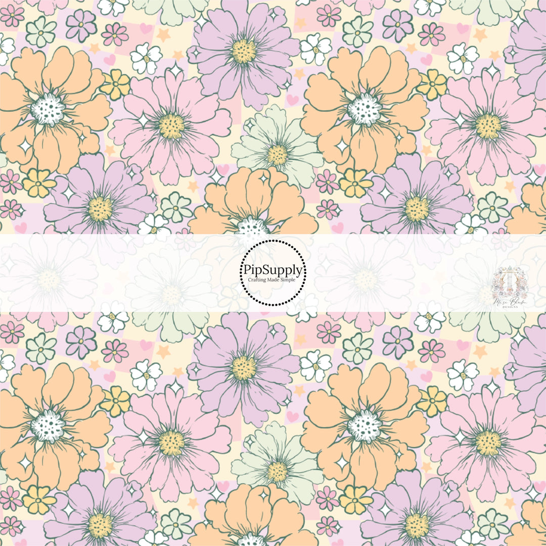 Light pink, purple, orange, and white flowers on a purple and cream checker board pattern fabric by the yard.