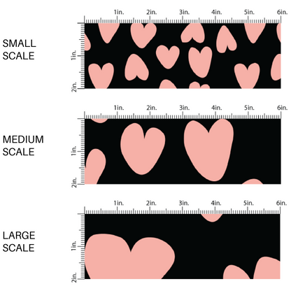 This scale chart of small scale, medium scale, and large scale of these heart and spot themed black fabric by the yard features leopard pattern with hearts and spots in pink on black. This fun animal themed fabric can be used for all your sewing and crafting needs! 