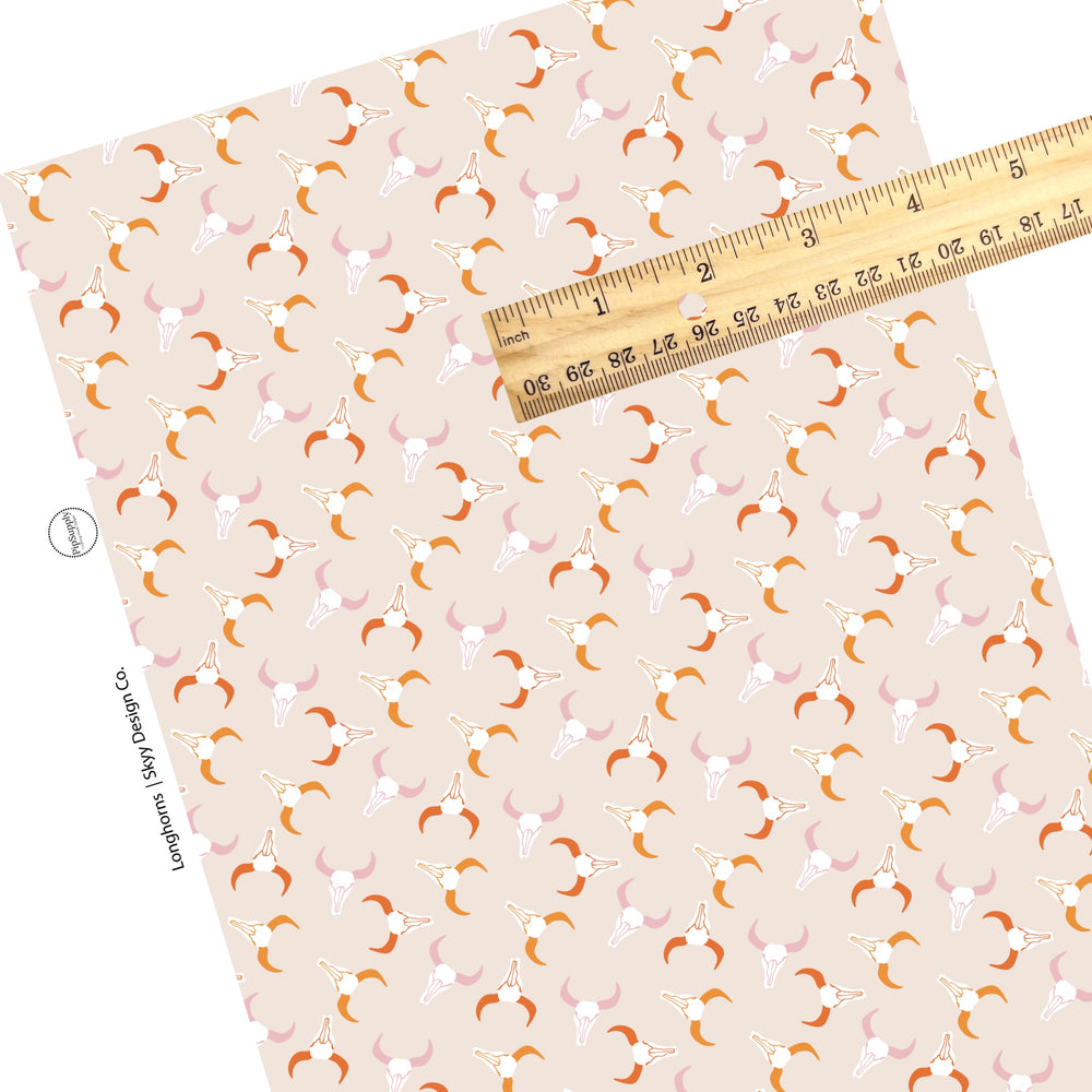 Western themed pink and orange longhorns faux leather sheets. 