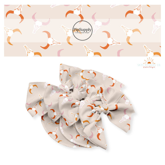 Western themed pink and orange longhorns hair bow strips. 