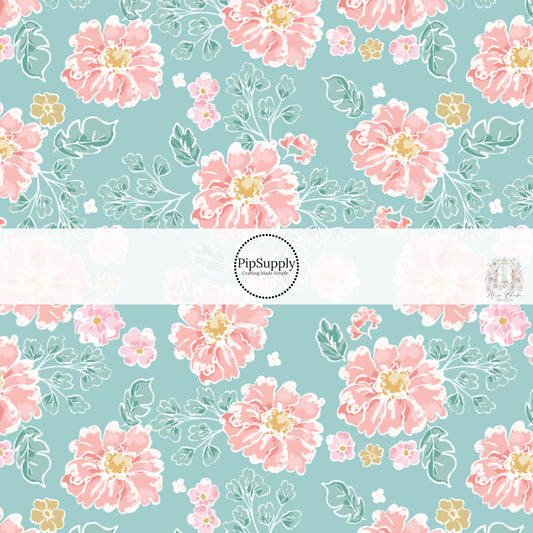 These floral themed light seafoam fabric by the yard features light peach, cream, and teal flowers on seafoam. This fun summer floral themed fabric can be used for all your sewing and crafting needs! 