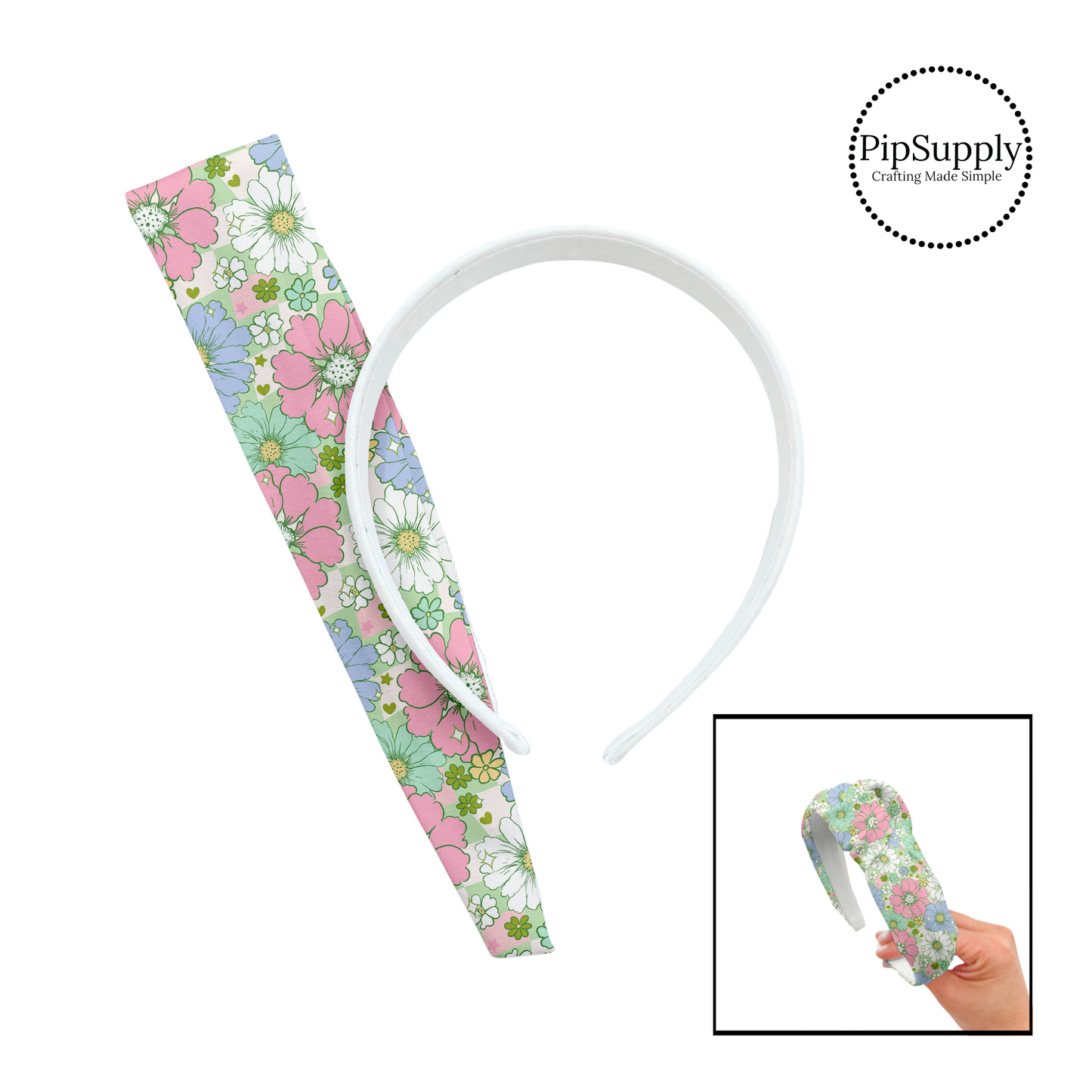 Light pink, green, blue, and white flowers of various sizes on a green and pink and cream checkered pattern DIY knotted headband kit. 