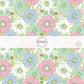 Light pink, green, blue, and white flowers on a green and cream checker board pattern fabric by the yard.