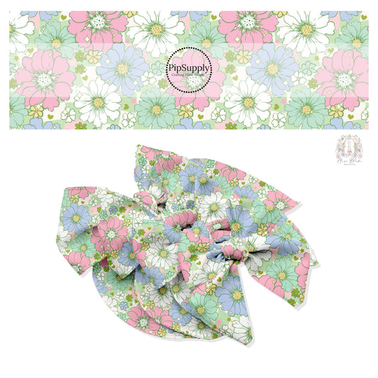 Light pink, green, blue, and white flowers of various sizes on a green and pink and cream checkered pattern hair bow strips.