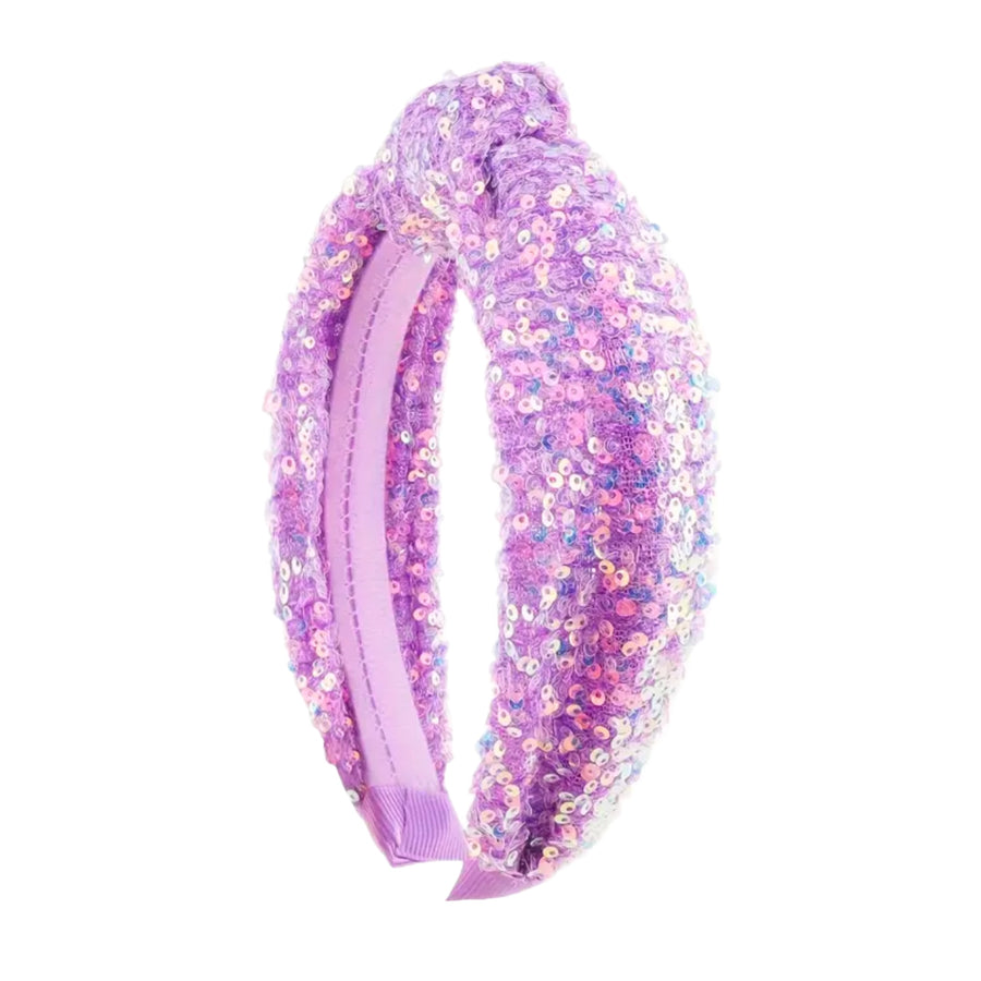 These light purple spring sequin knotted headbands are a stylish hair accessory having the look of a knotted headwrap and the on and off ease of a headband. Made with high quality fabric these headbands are a perfect simple and fashionable answer to keeping your hair back!