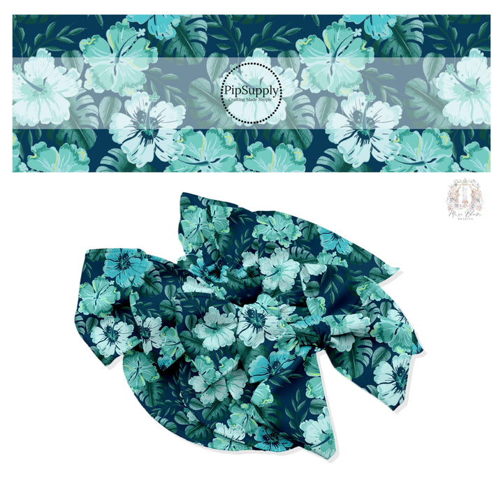 Light blue and aqua tropical flowers and palms on dark navy hair bow strips. 