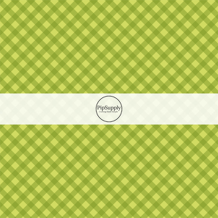 These spring fabric by the yard features green plaid pattern. This fun pattern fabric can be used for all your sewing and crafting needs!