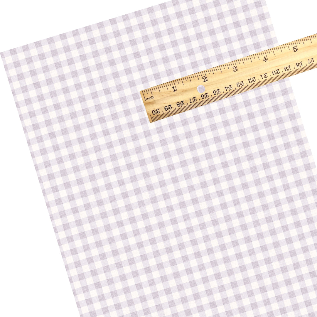 These Easter themed faux leather sheets contain the following design elements: lilac linen checker pattern. Our CPSIA compliant faux leather sheets or rolls can be used for all types of crafting projects.