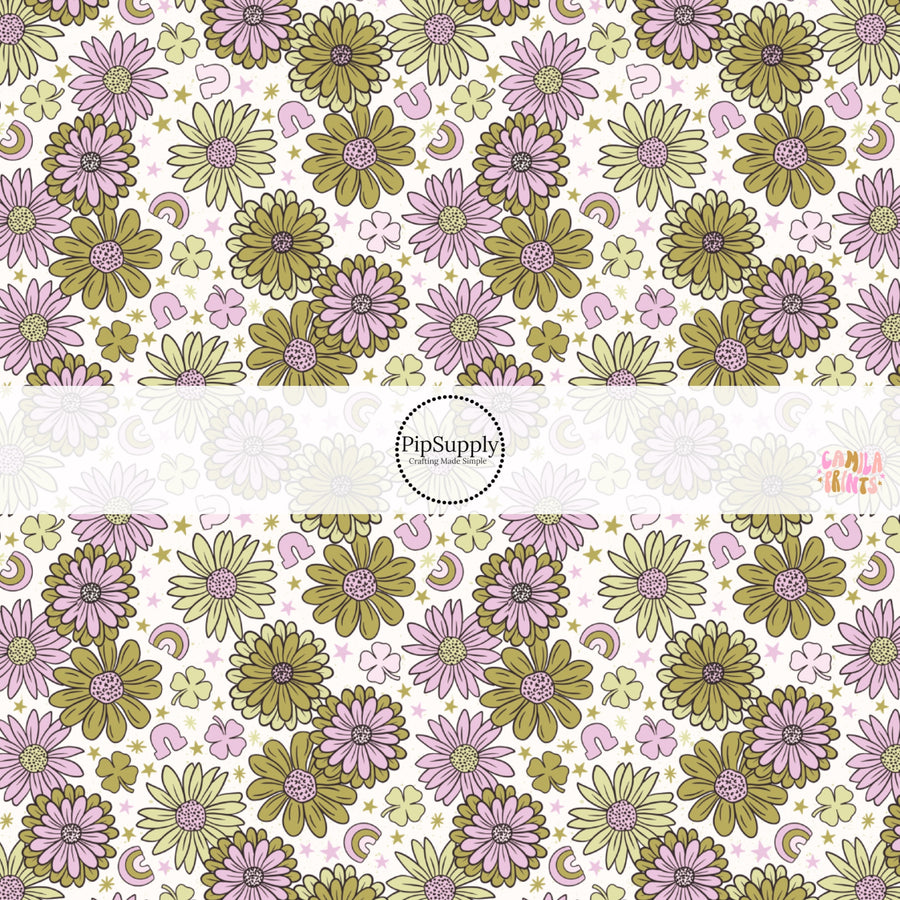 This holiday fabric by the yard features green and purple flowers. This festive pattern fabric can be used for all your sewing and crafting needs!