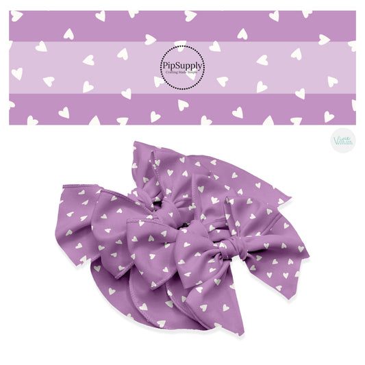 Scattered cream hearts on purple hair bow strips