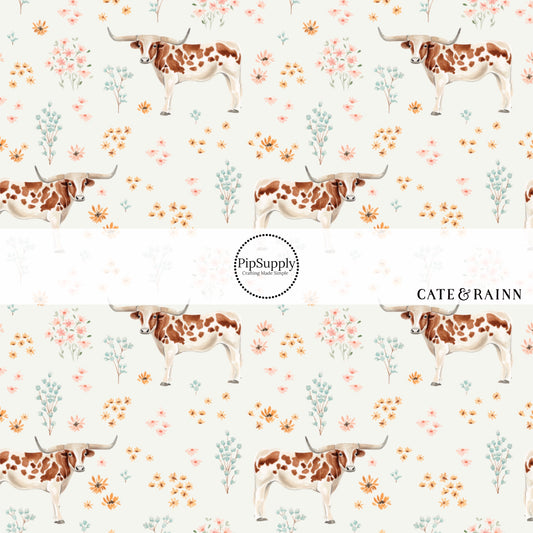 This summer fabric by the yard features longhorns and blush wildflowers on cream. This fun summer themed fabric can be used for all your sewing and crafting needs!