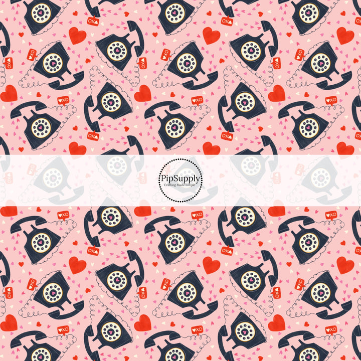 This holiday fabric by the yard features telephones and hearts. This festive pattern fabric can be used for all your sewing and crafting needs!