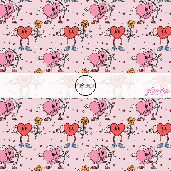 This holiday fabric by the yard features cupid hearts on pink. This festive pattern fabric can be used for all your sewing and crafting needs!