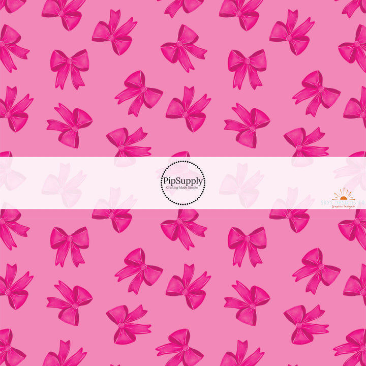 This holiday fabric by the yard features pink bows on pink. This festive pattern fabric can be used for all your sewing and crafting needs!