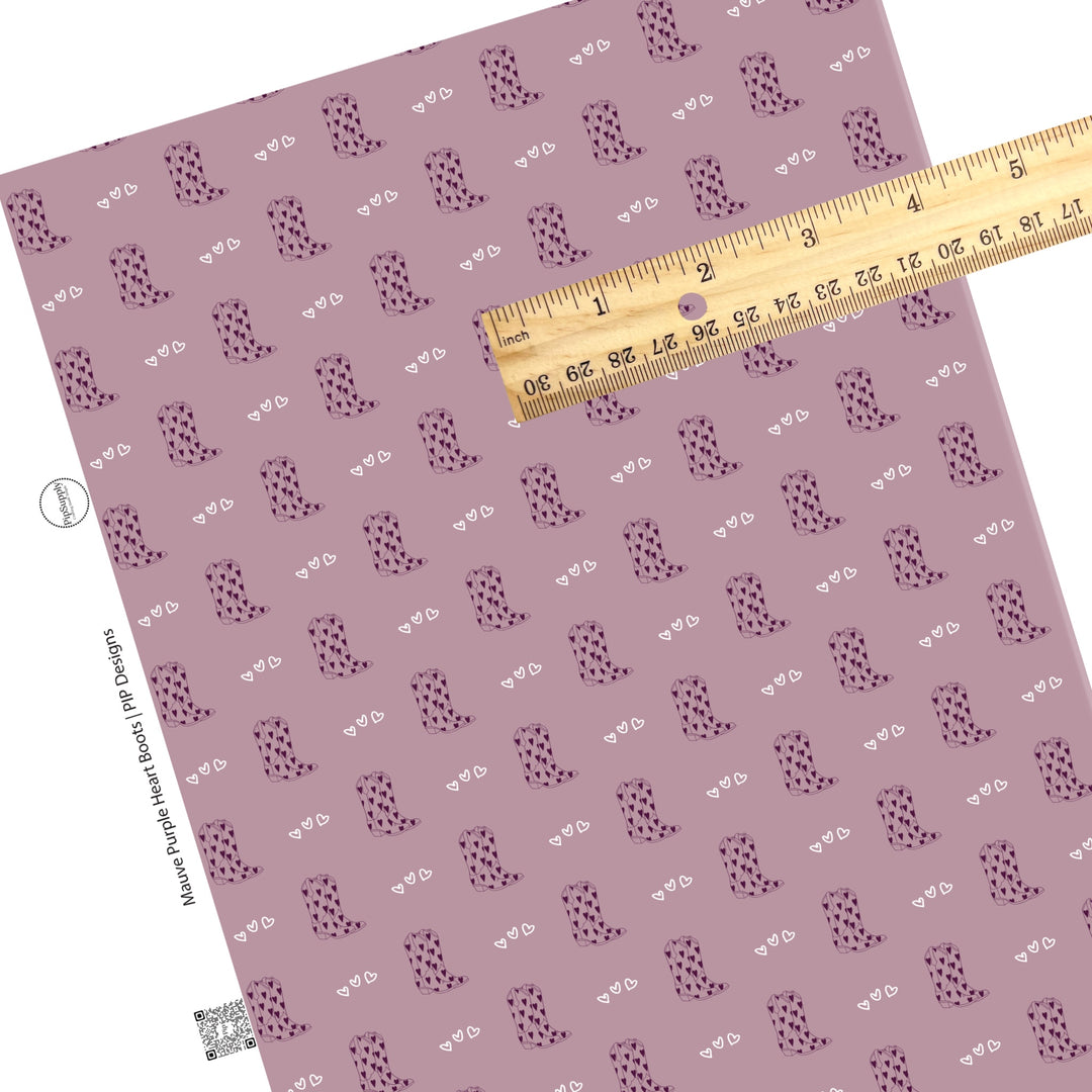 These western themed faux leather sheets contain the following design elements: cowgirl boots and tiny hearts on purple. Our CPSIA compliant faux leather sheets or rolls can be used for all types of crafting projects. The designer of this pattern is Hay Sis Hay. 