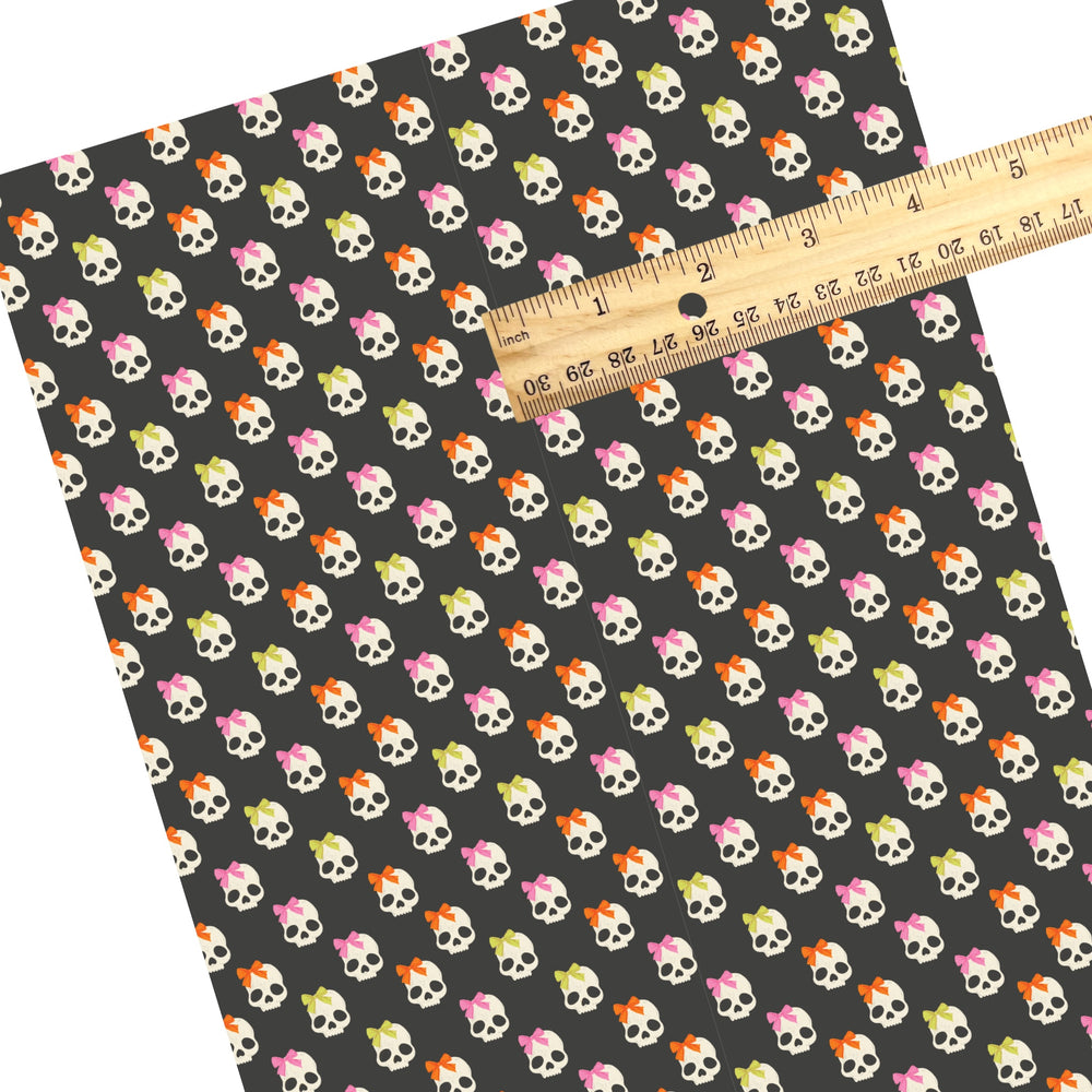 These Halloween themed pattern faux leather sheets contain the following design elements: white skulls with bows on gray. Our CPSIA compliant faux leather sheets or rolls can be used for all types of crafting projects.