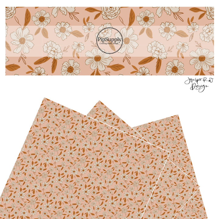 These spring flowers faux leather sheets contain the following design elements: cream flowers on peach. Our CPSIA compliant faux leather sheets or rolls can be used for all types of crafting projects. 